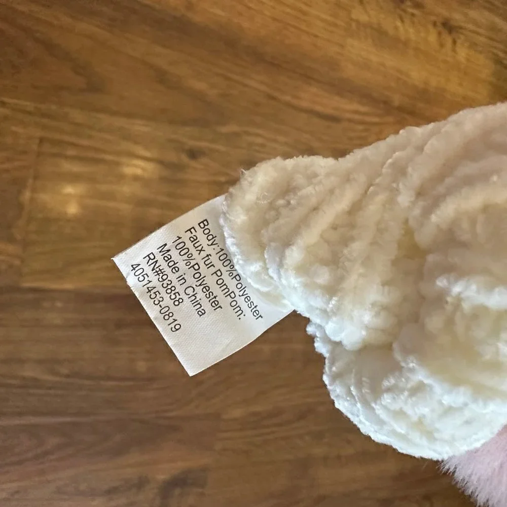 Knit mittens with fuzzy Pom Pom